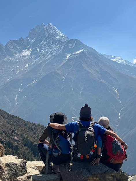 Three Friends Admire Everest's Majestic View